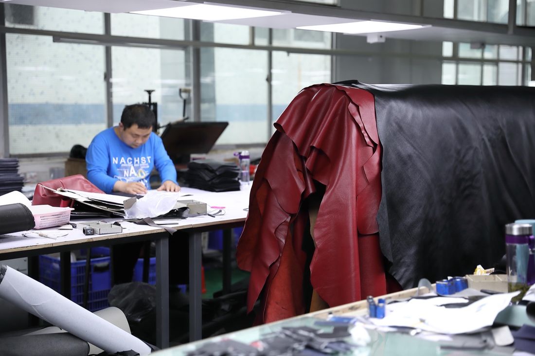 Pattern making and leather cutting at Elvion workshop